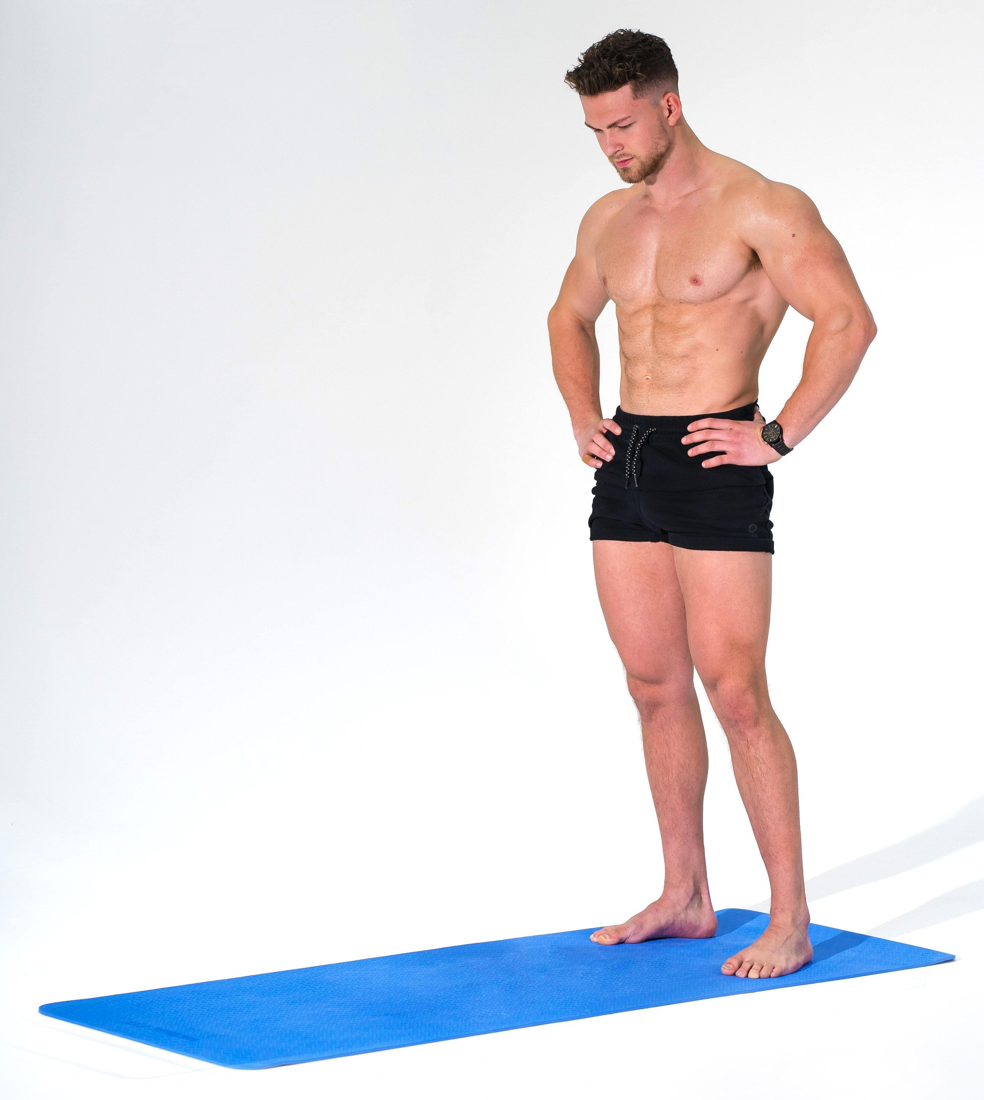 Man modeling the Redge Fit Double Sided Workout Mat Available at https://www.getredge.com/products/redge-workout-mat