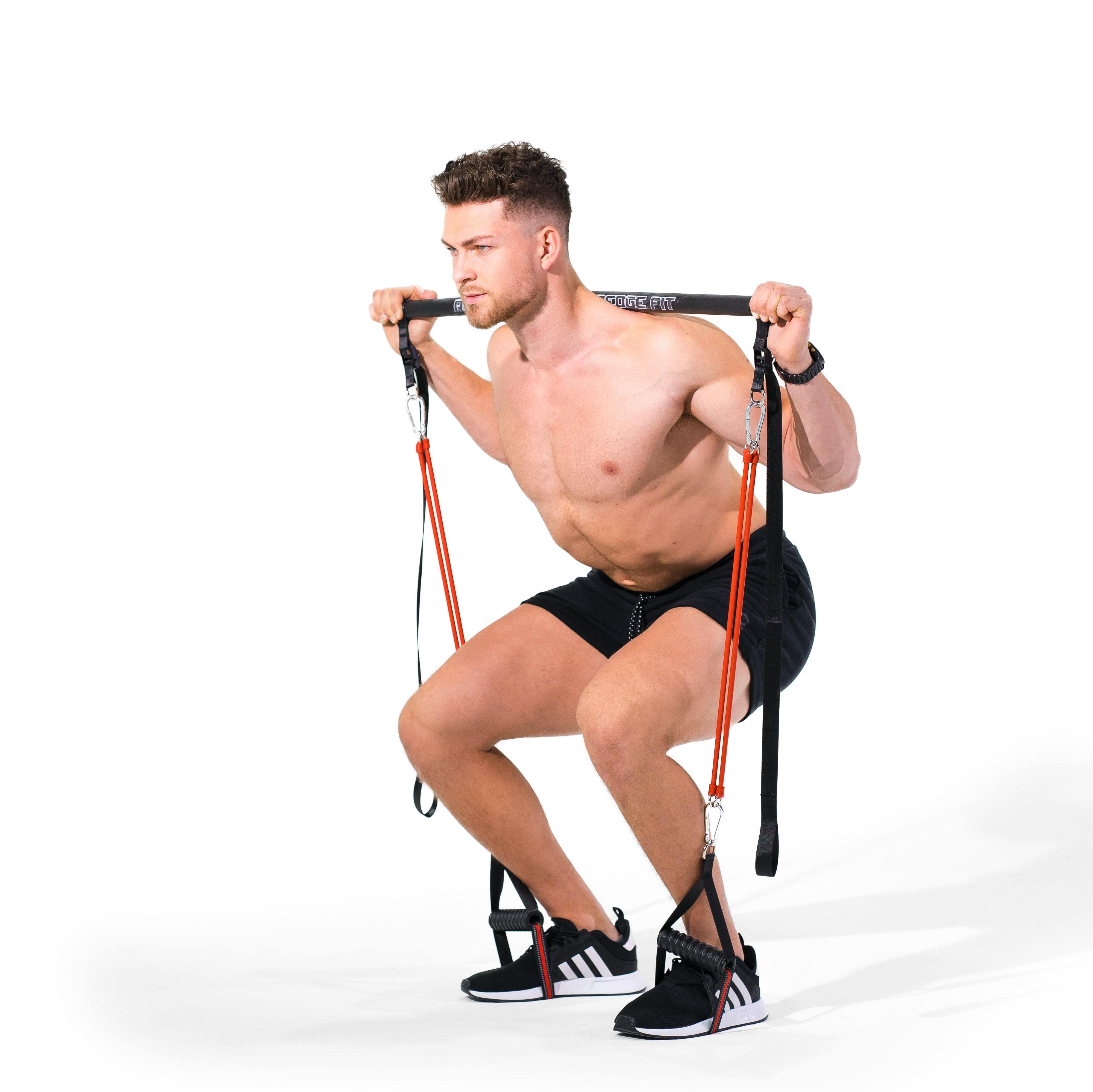 Man modeling the Redge Fit Home Gym Pro Pack Portable Gym Machine Available at https://www.getredge.com/products/home-gym-pro-pack