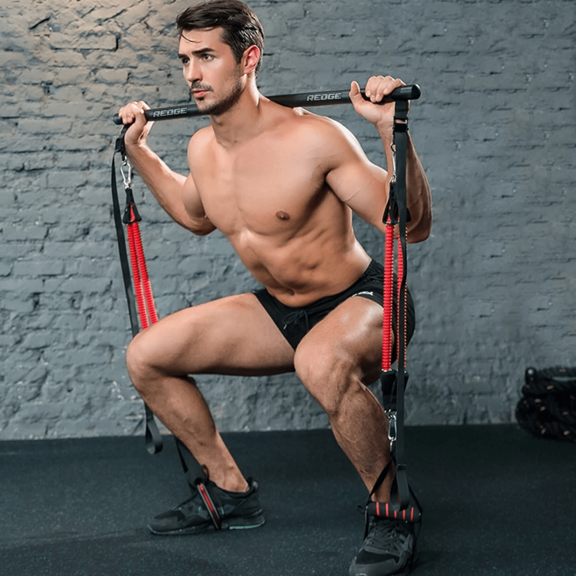 Man modeling the Redge Fit Portable Gym Machine Available at https://www.getredge.com/products/portable-gym-system
